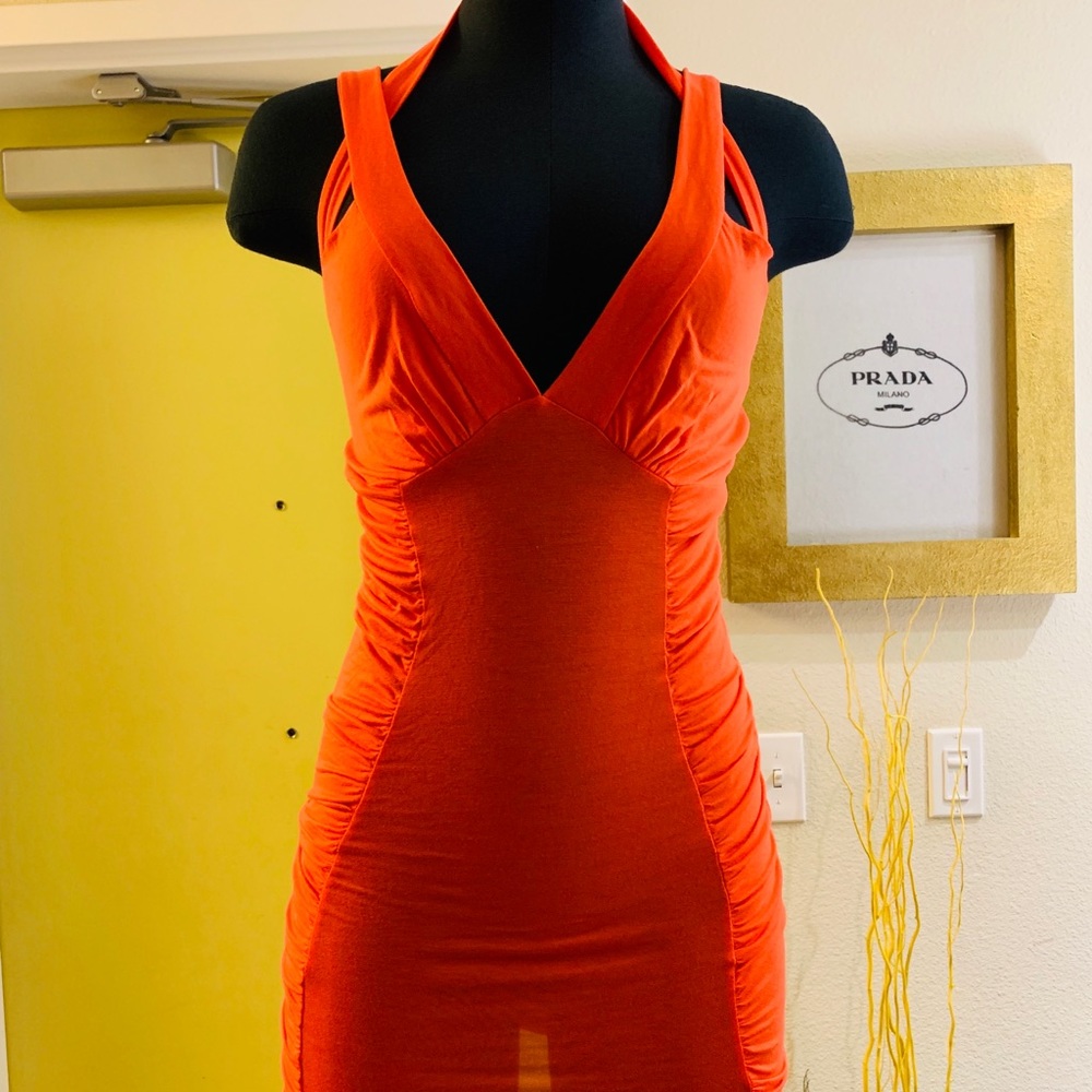 Neon orange fitted mini dress
